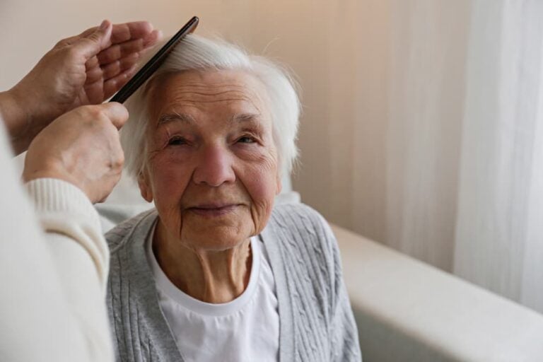 An old woman getting her hair combed - Adult Guardianship